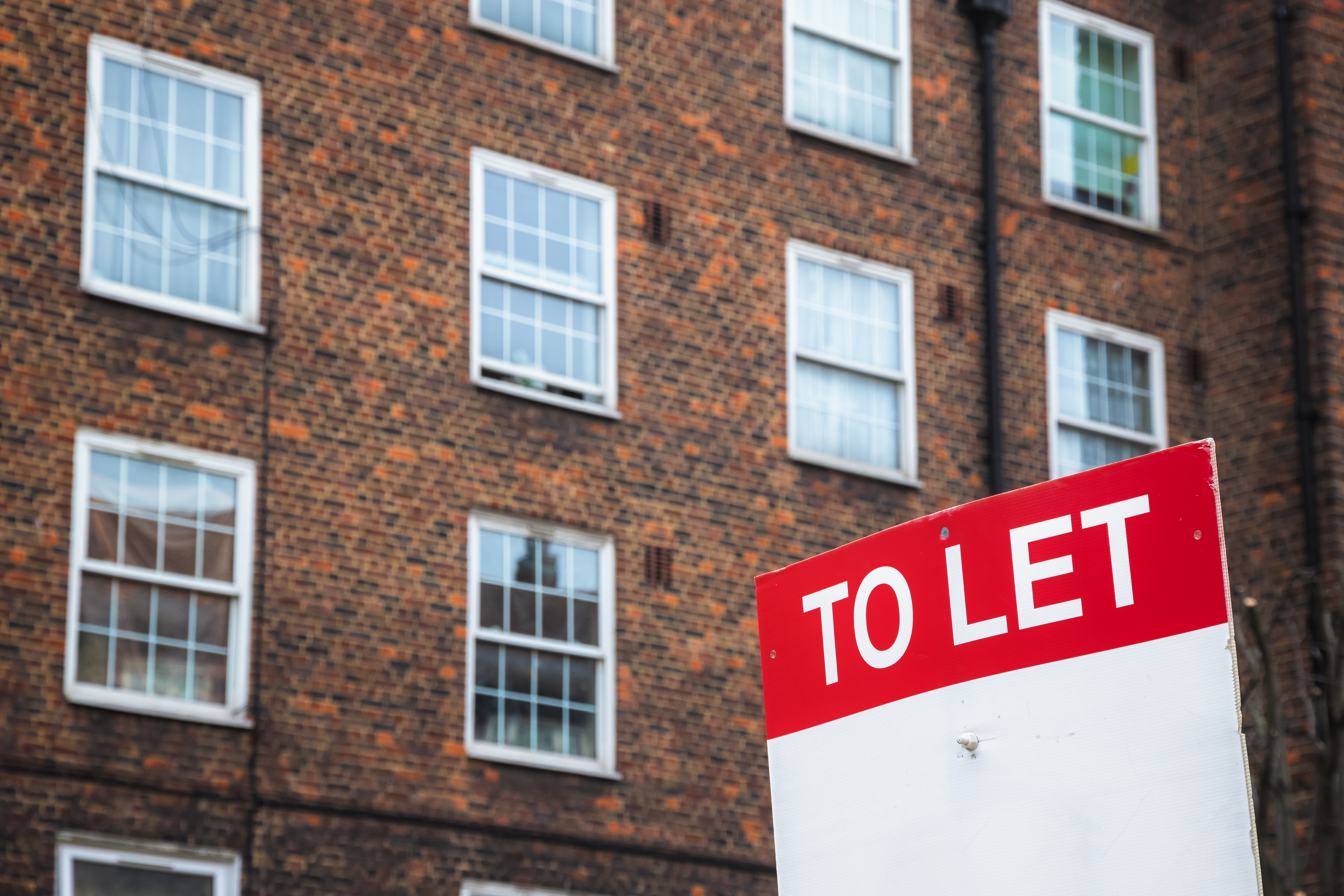 A to let sign outside a block of flats